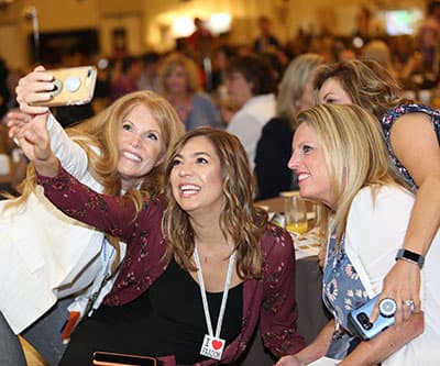 AADOM members taking a selfie at the AADOM Conference